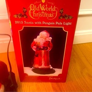 MERCK Old World Christmas Santa with Penguin Pals 2013.